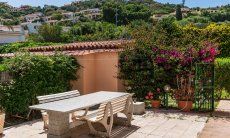 Villa Palme | Big, granite table with view on the hill of Costa Rei Villa Palme, Costa Rei