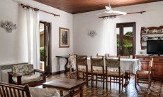 Villa Palme | Dining area with big table and direct access to the terrace Villa Palme, Costa Rei