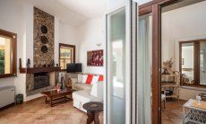 Villa Tiziana 11 | From the sofa corner you can access the roofed inner court yard Portrait of the house