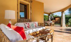 Villa Tiziana 11 | The outside sofa made of bamboo invites you to relax Portrait of the house