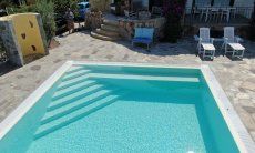 Villa Maestrale | Pool with stairs to enter Villa Maestrale, Cala Ginepro, North Sardinia