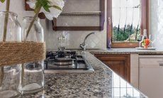 Villa Maestrale | Kitchen with granite top, gas stove and dishwasher Villa Maestrale, Cala Ginepro, Olbia