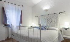 Villa Maestrale | Bedroom 1 with double bed upstairs Villa Maestrale, Cala Ginepro, Olbia