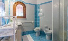 Villa Maestrale | Bath 1 with shower upstairs Villa Maestrale, Cala Ginepro, Olbia
