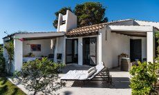 Villetta 3 | Spacious, covered terrace with brick barbecue Outdoor area Villetta 3 Costa Rei