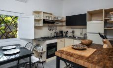 Casa 1 | Spacious fully equipped kitchen with dining area Kitchen Casa 1 Sant'Elmo