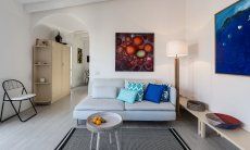 Casa 1 | An open corridor leads from the living room to the kitchen Livingroom Casa 1 Sant'Elmo