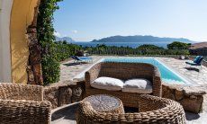 Villa Maestrale | Cozy sitting area by the pool Lounge and pool Villa Maestrale, Olbia