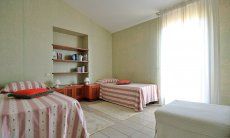 Villa Ulivi 27 | Bedroom with two single beds V. Ulivi 27