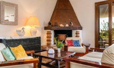 Villa Palme | Sitting area in the living room directly by the fireplace New Picture