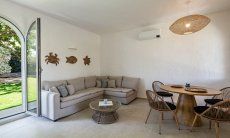 Villa Donatella | Couch and indoor dining area New Picture 2024