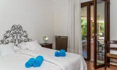 Villa Palme | Bedroom 2 with exit to the terrace New Picture