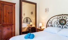 Villa Palme | Bedroom 1 with double bed New Picture