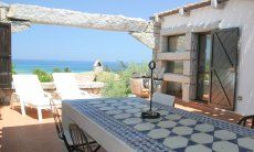 Covered dining area on the terrace of  Casa 20, Sant Elmo