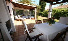 Terrace with dining table and BBQ area 