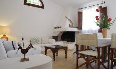 Villa Fiori 4 | Living room with a sofa and dining table Living room with a sofa and dining table