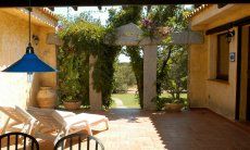 Casa Meloni 1 | Dining table on the terrace with garden view Dining table on the terrace with garden view