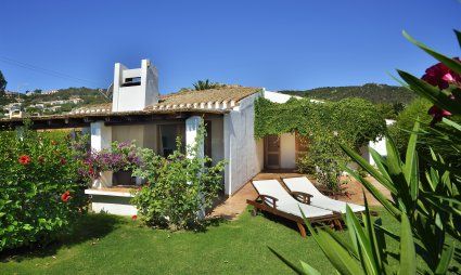 Villa Kika | View of the garden and the villa