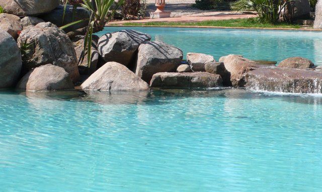 Pool with granite rocks Li Conchi, Cala Sinzias